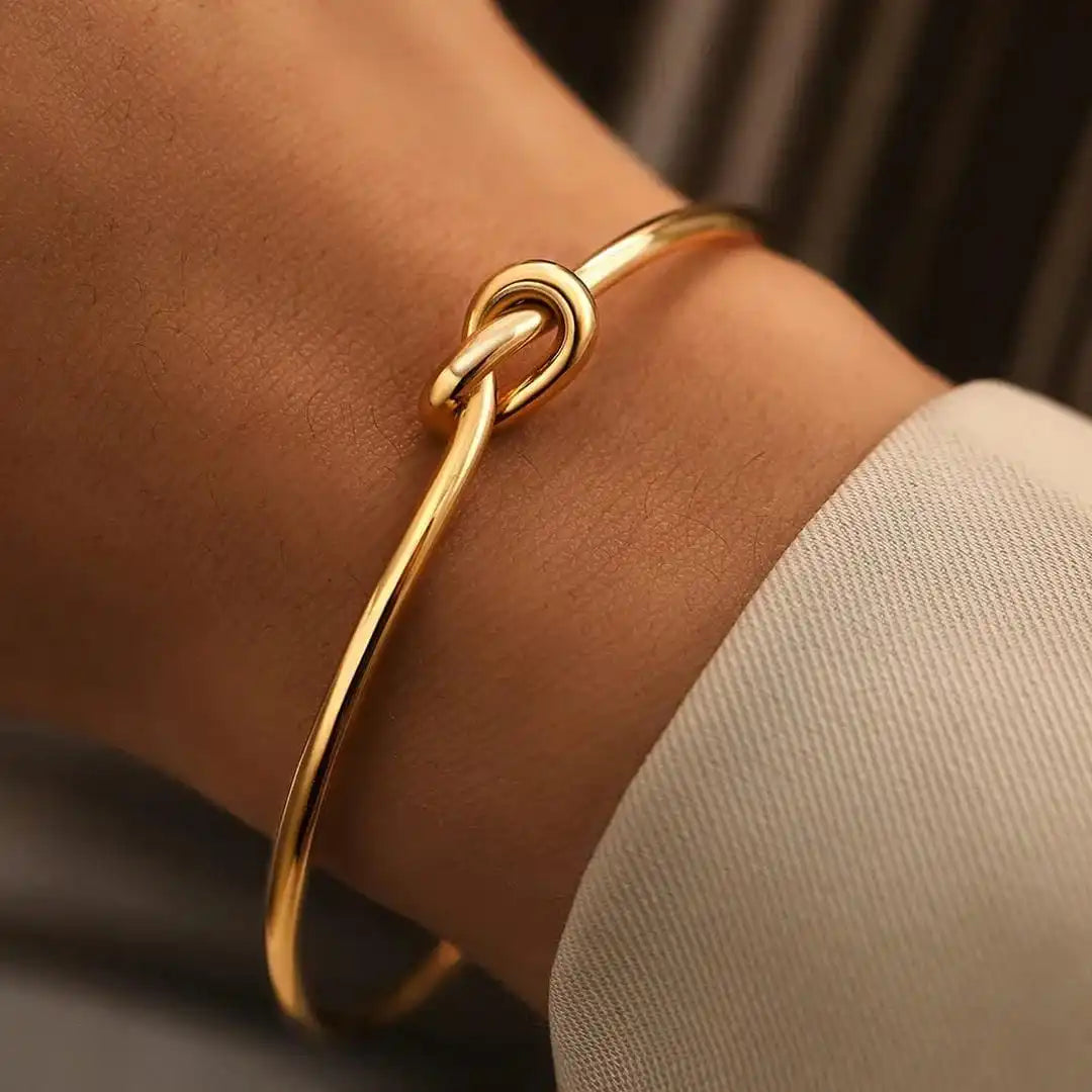 Bracciale Regolabile con Nodo Dorato