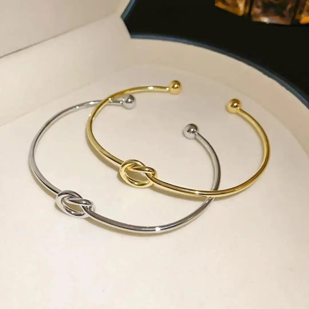 Bracciale Regolabile con Nodo Dorato