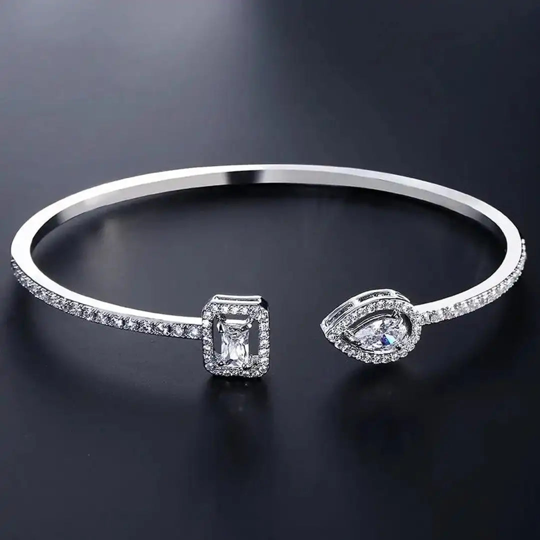 Bracciale Rigido Aperto Dorato a Due Pietre