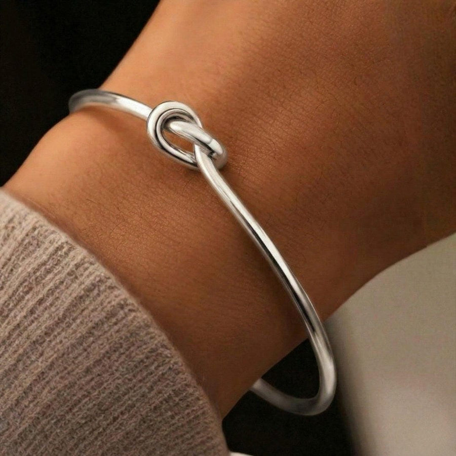 Bracciale Regolabile con Nodo Dorato